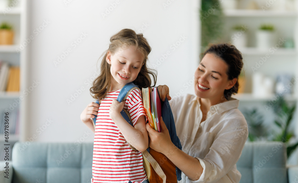 Happy family preparing for school