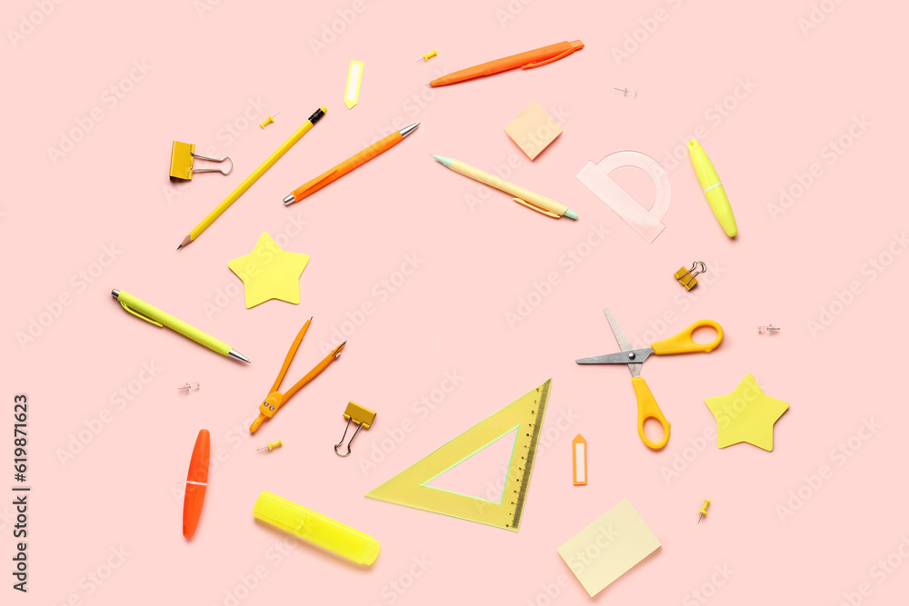 Composition with stationery supplies on pink background