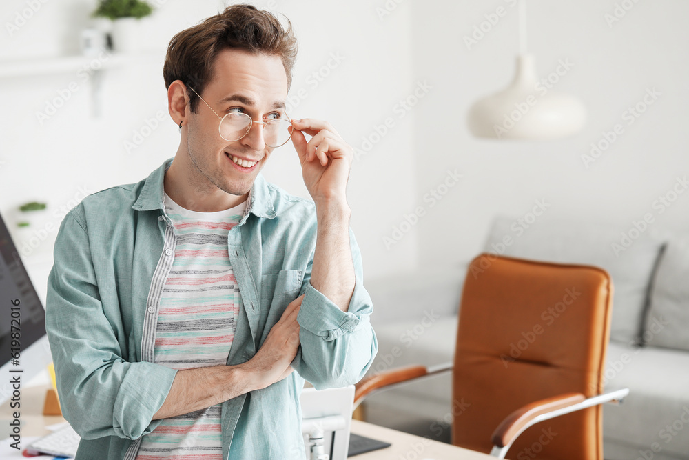 Portrait of male graphic designer in office