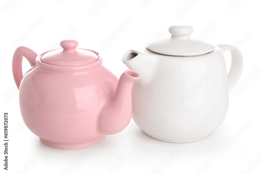 Ceramic teapots on white background