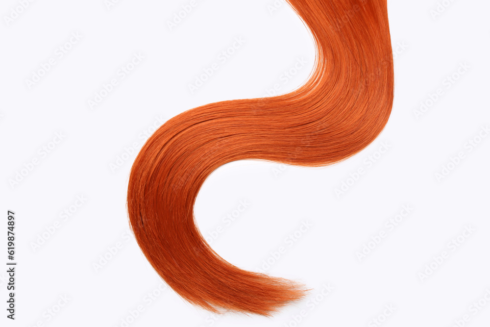 Beautiful ginger hair strand isolated on white background, closeup