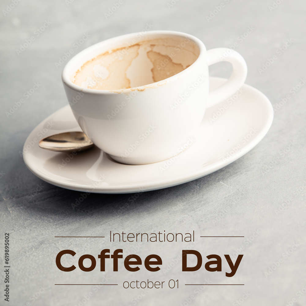 Empty coffee cup after drink on concrete background, coffee day