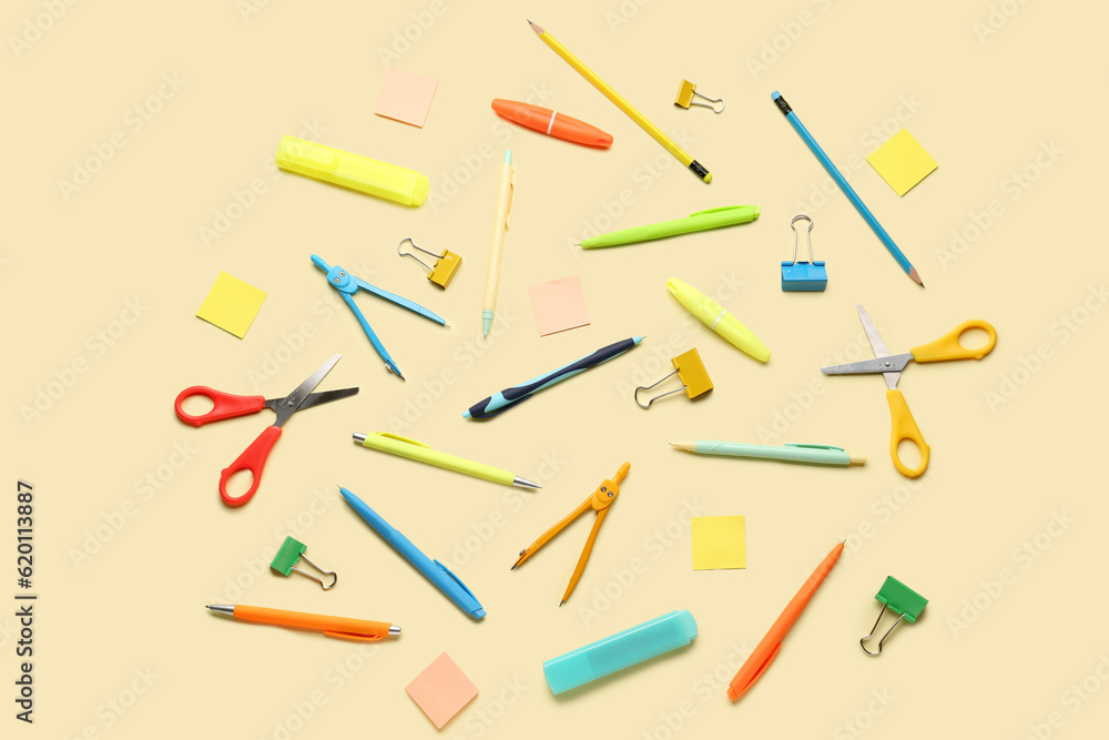 Composition with stationery supplies on yellow background