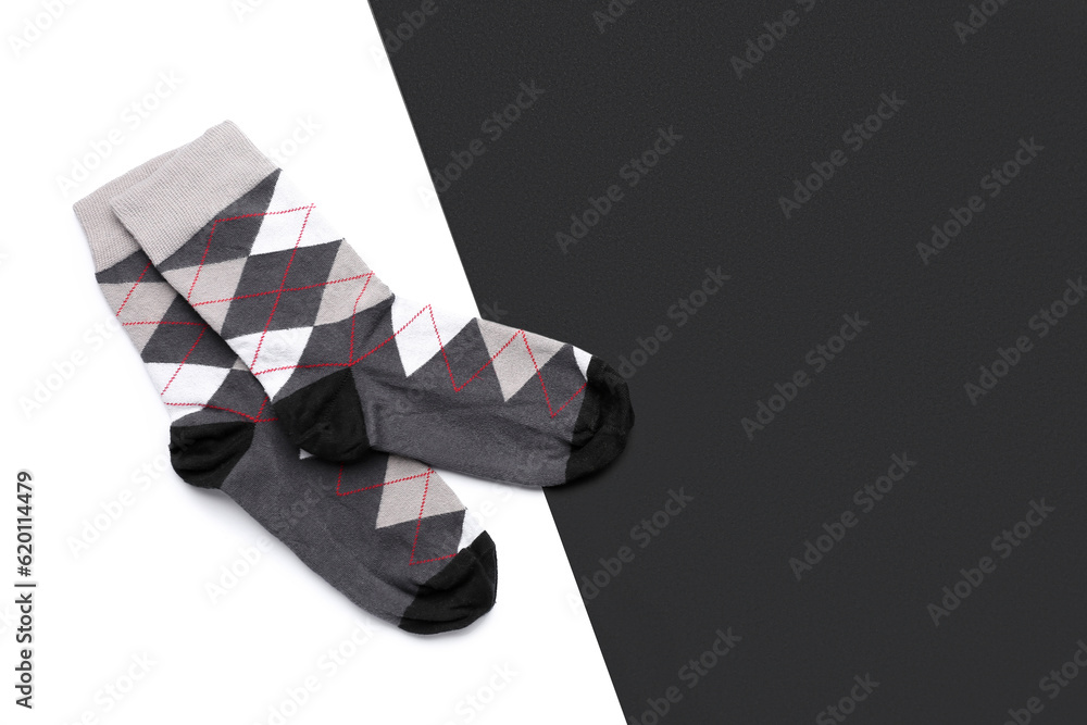 Pair of socks on black and white background