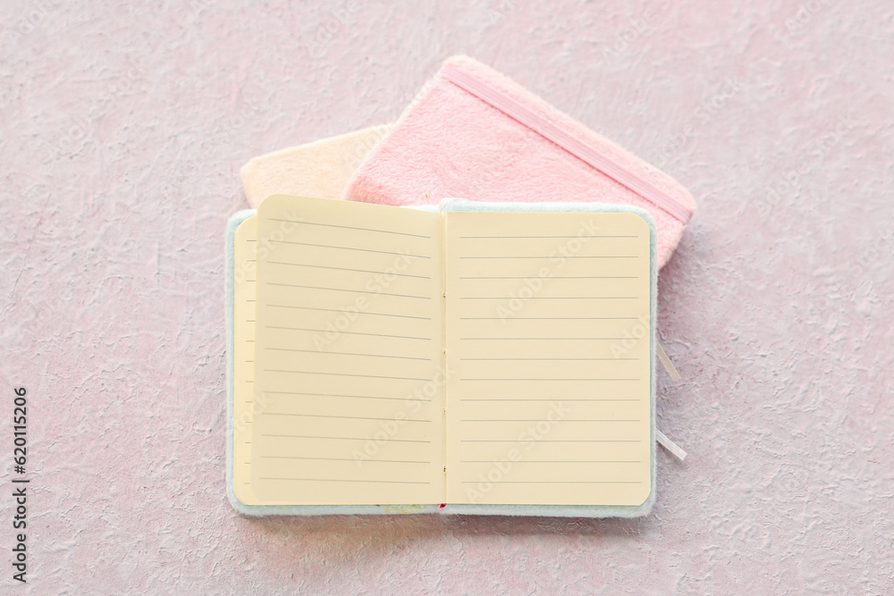 Blank open notebook on light background