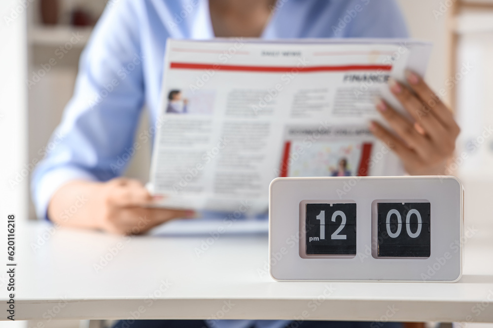 Clock on table in office. Time management concept