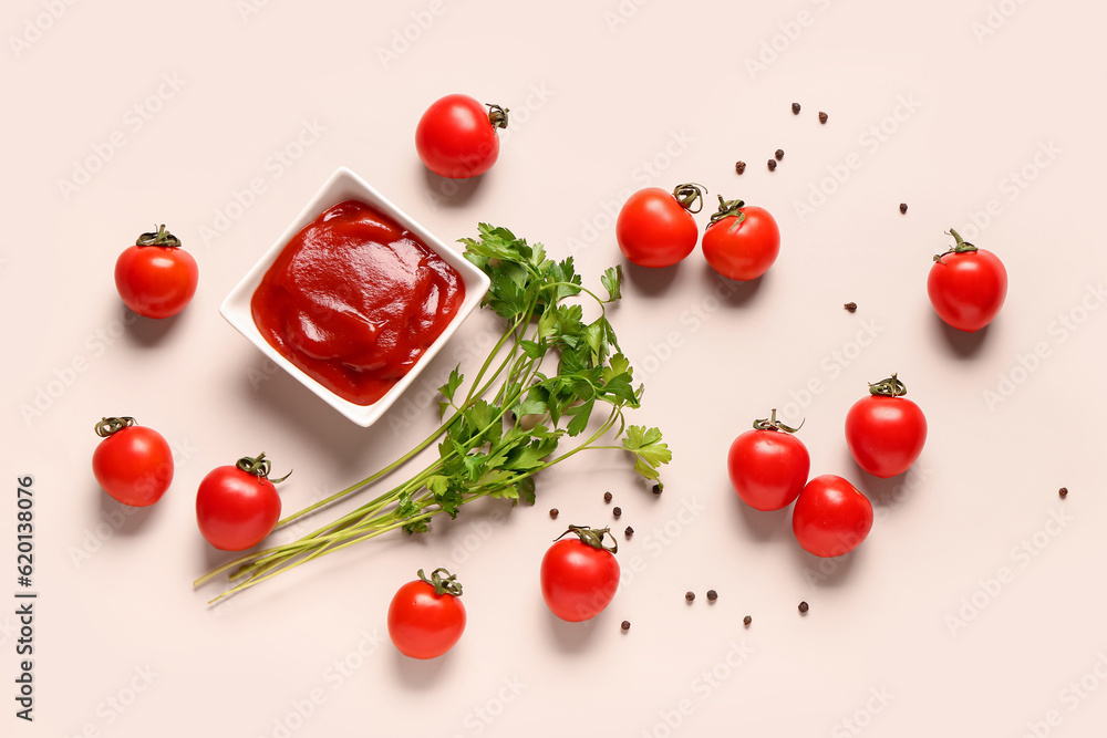 Bowl with tomato paste and fresh vegetables on light background