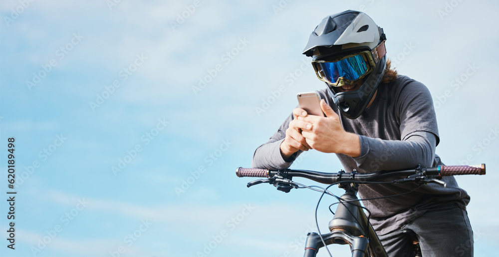 Phone, mockup and cyclist on a bicycle typing social media, online or internet for bike extreme spor