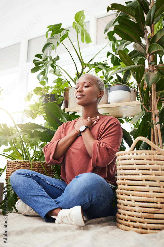 Wellness, peace and woman breathing by plants for meditation in a natural greenhouse. Breathe, grati