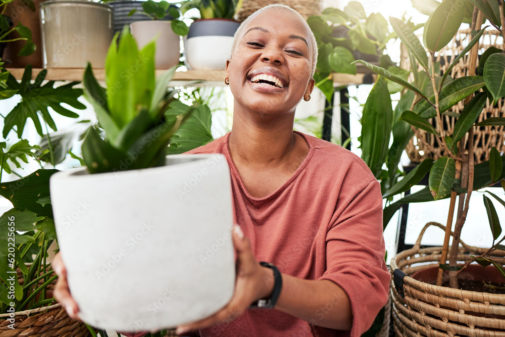 Happy, smile and woman with a plant in the greenhouse for an eco friendly or sustainable gift. Happi