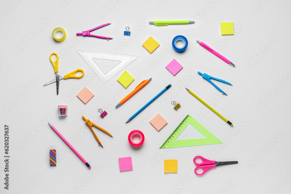 Composition with different stationery on light background