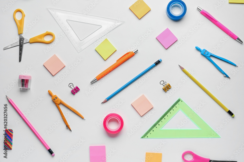 Composition with different stationery on light background