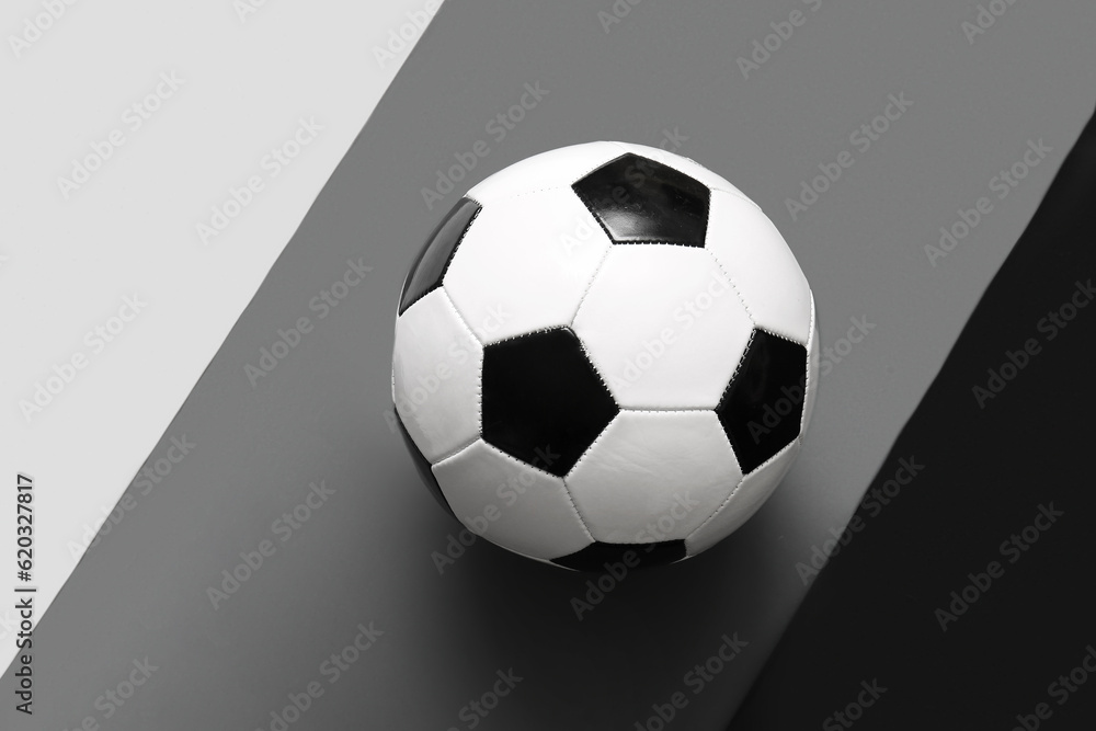 Soccer ball on grey background