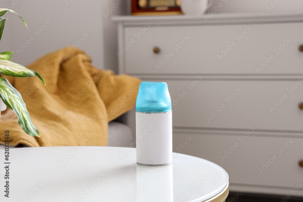 Air freshener on table in living room, closeup