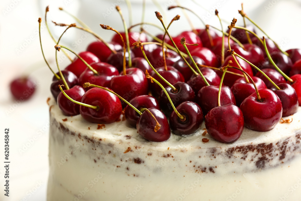 Tasty cake with fresh cherries, closeup