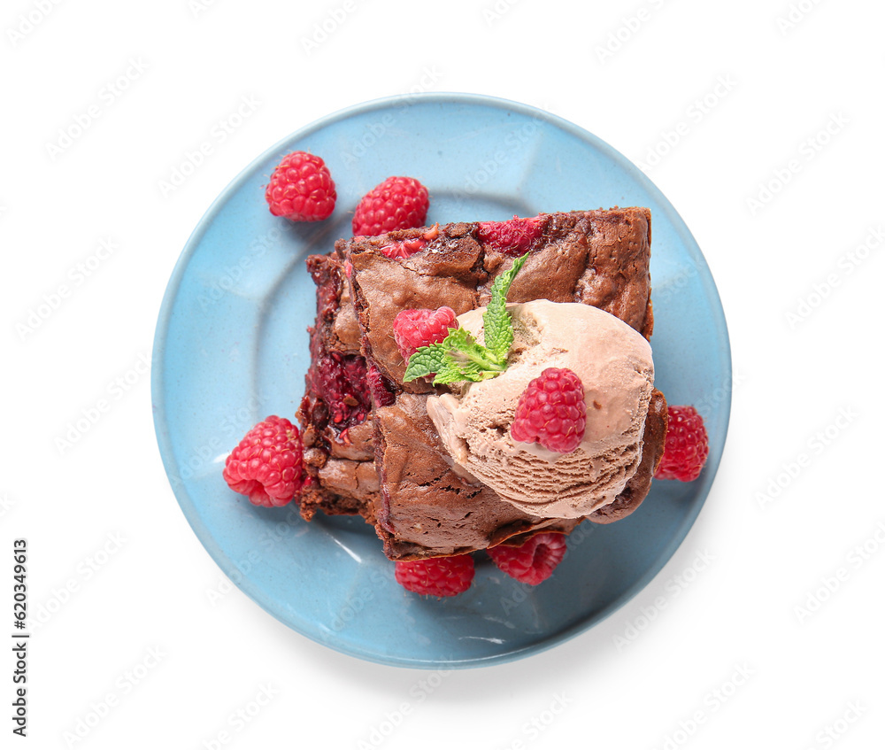 Plate with raspberry chocolate brownie and ice-cream on white background