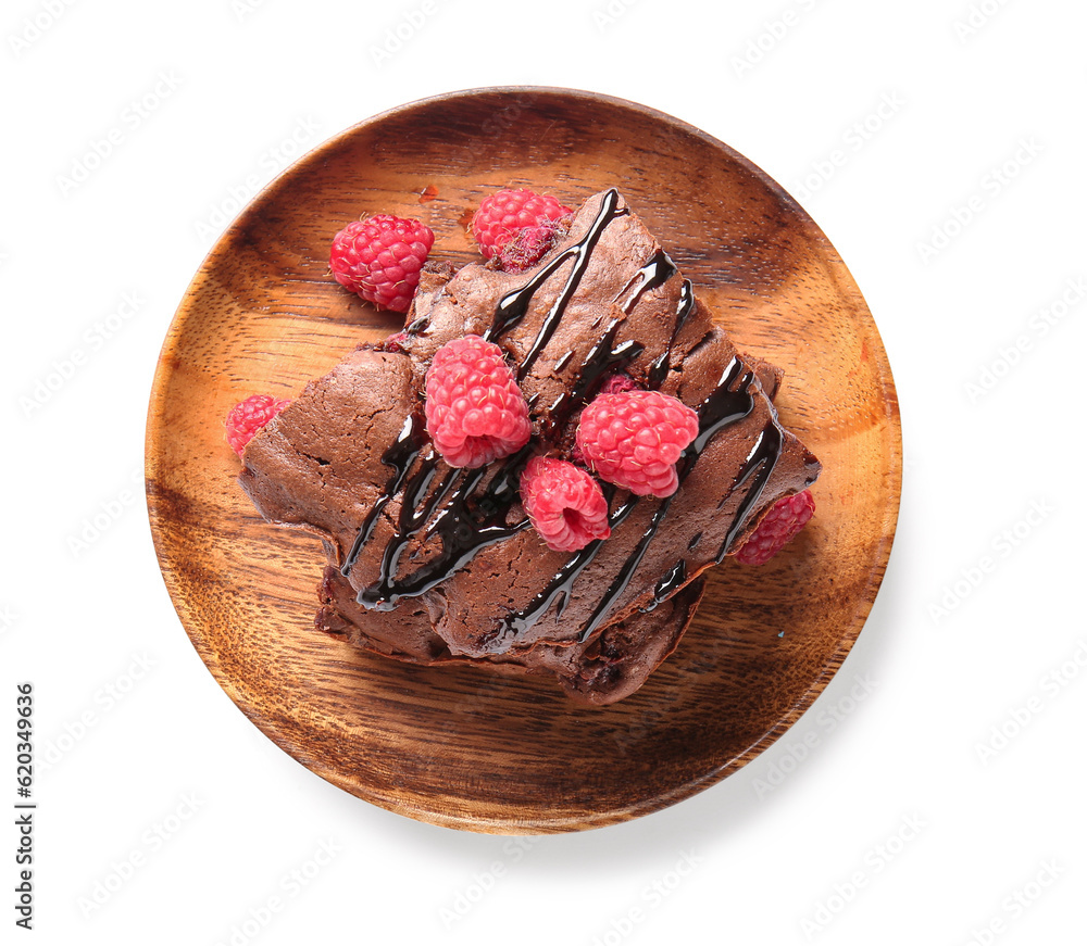 Plate with pieces of raspberry chocolate brownie on white background