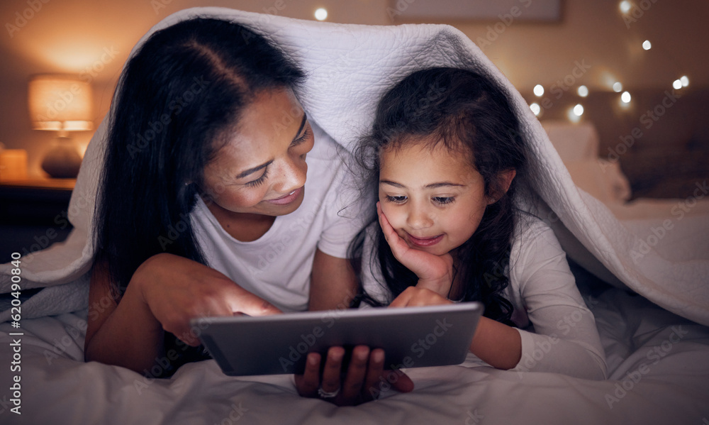 Mother, child and tablet with blanket at night in home for online games, reading ebook story and mov