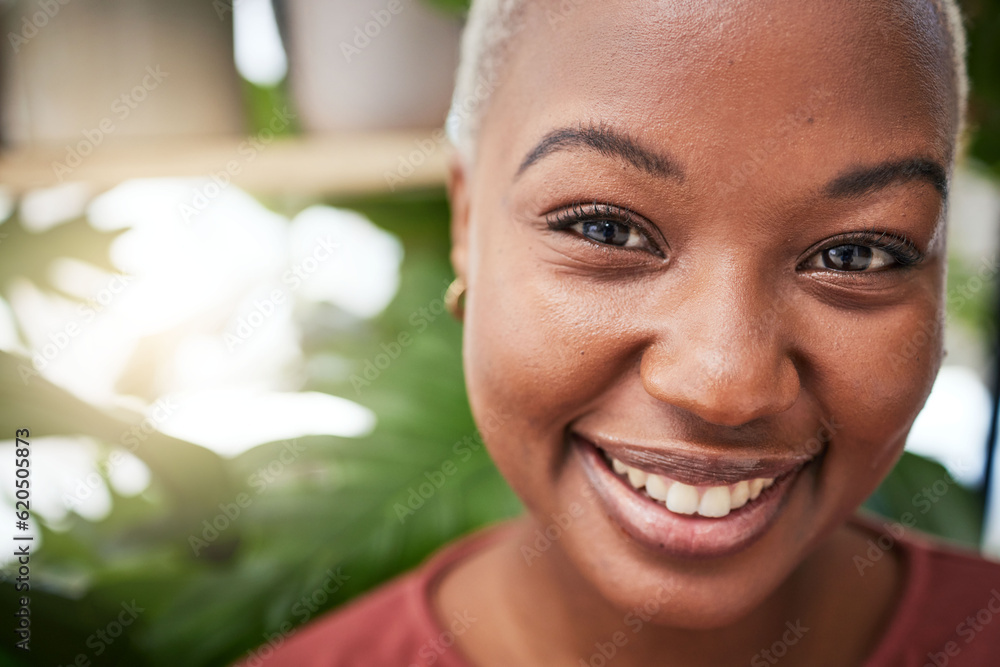 Portrait, plants and smile with a black woman gardener in her home for sustainability or green growt