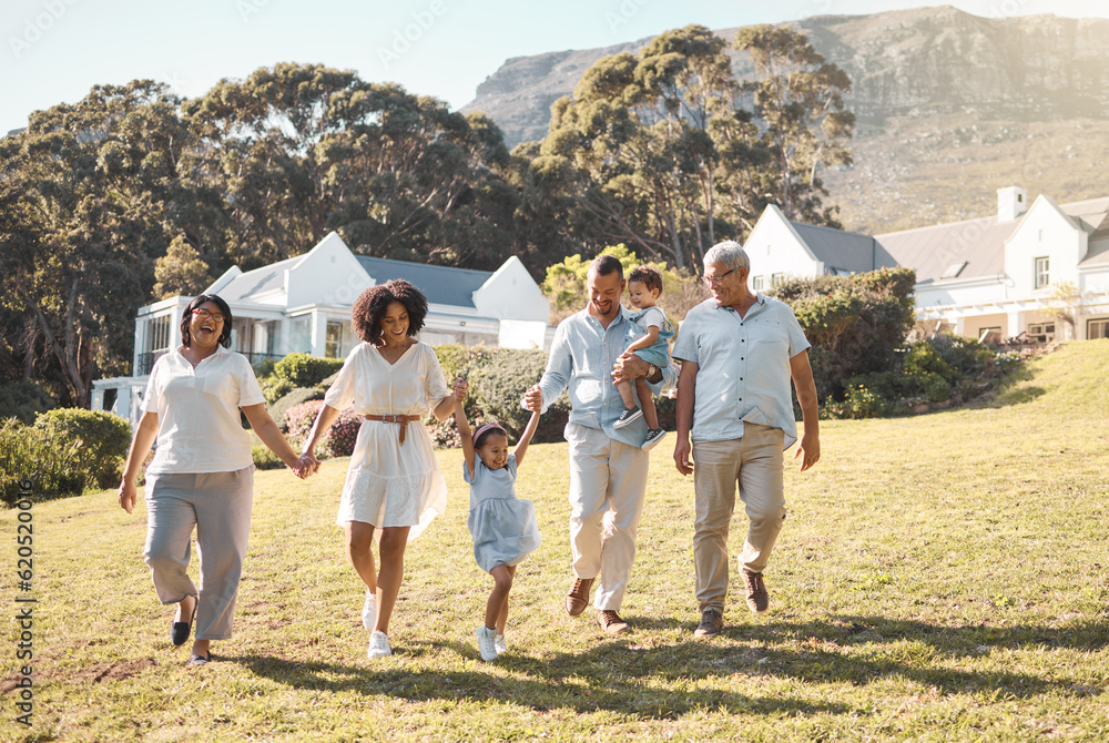 Holding hands, kids and a blended family walking in the garden of their home together during summer.