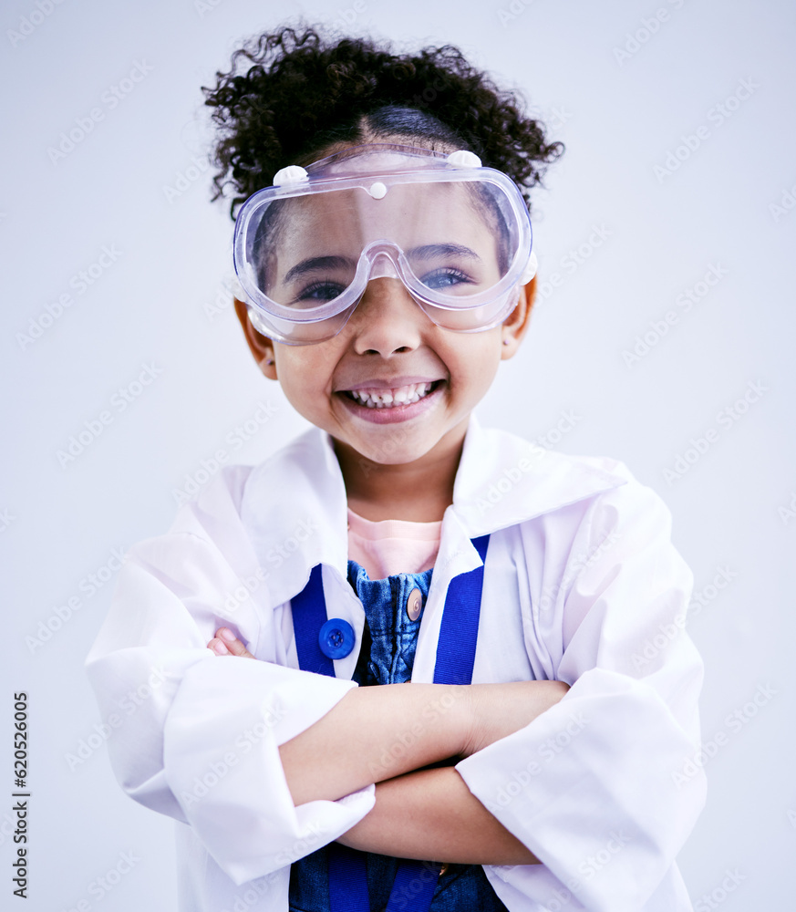 Child, portrait and happy scientist girl in studio with arms crossed, glasses and a smile. Face of a