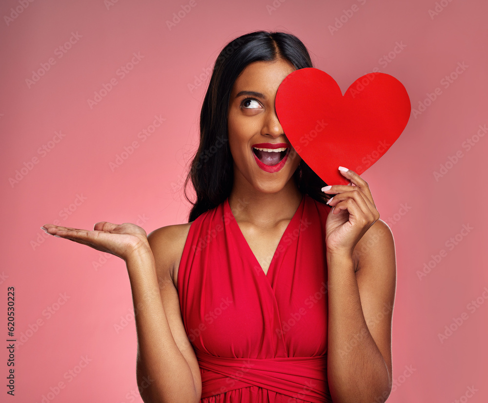 Woman, happy surprise and heart, advertising mockup in red dress and promotion of love on pink backg