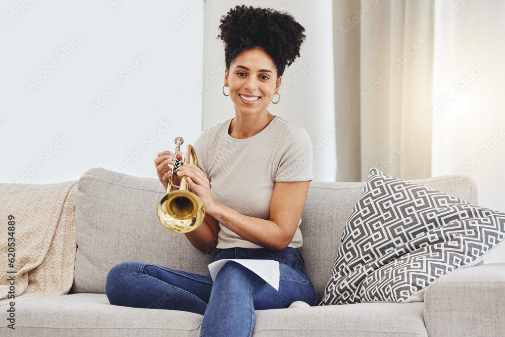 Portrait, woman and trumpet in home for music, learning and practice classic jazz song. Happy young 