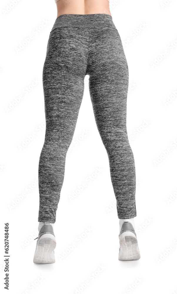 Sporty young woman in leggings on  white background, back view