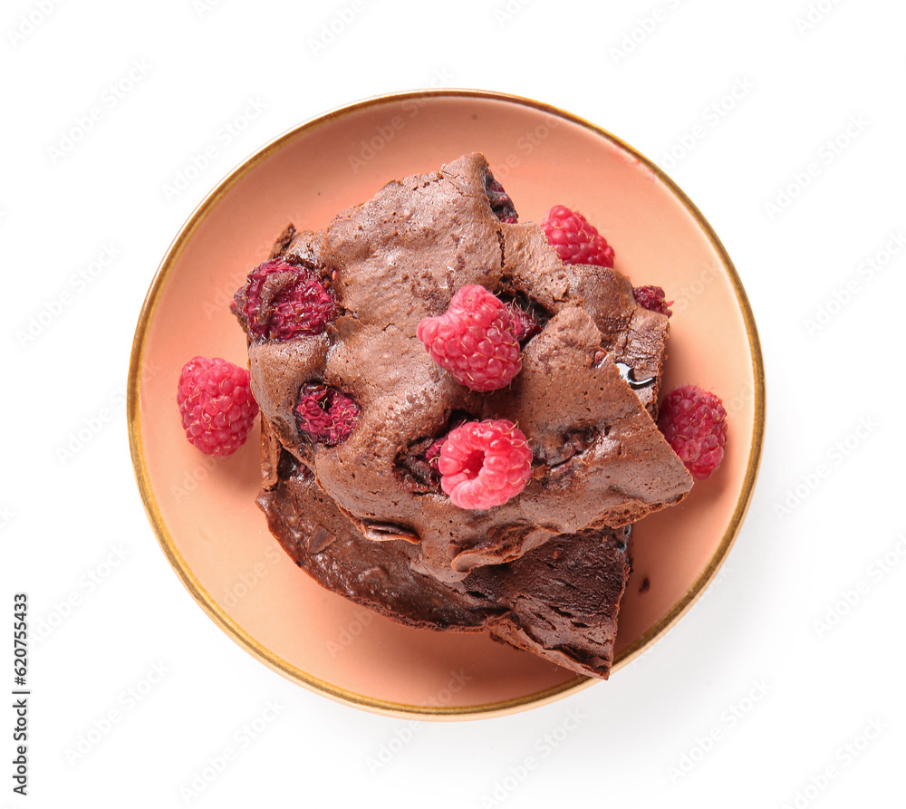 Plate with pieces of raspberry chocolate brownie on white background