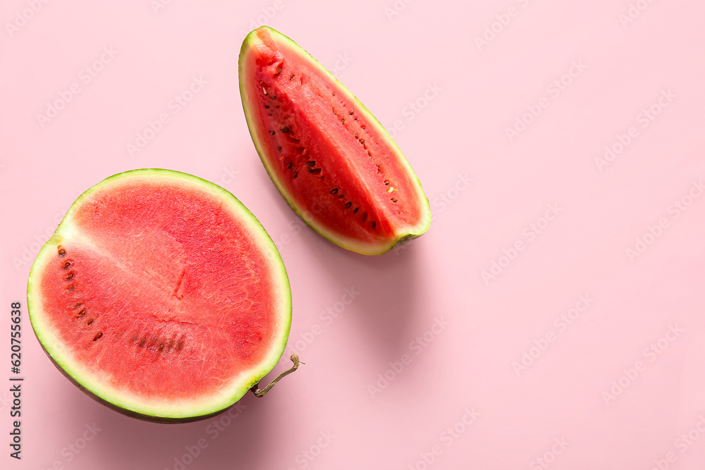 Half of fresh watermelon with piece on pink background