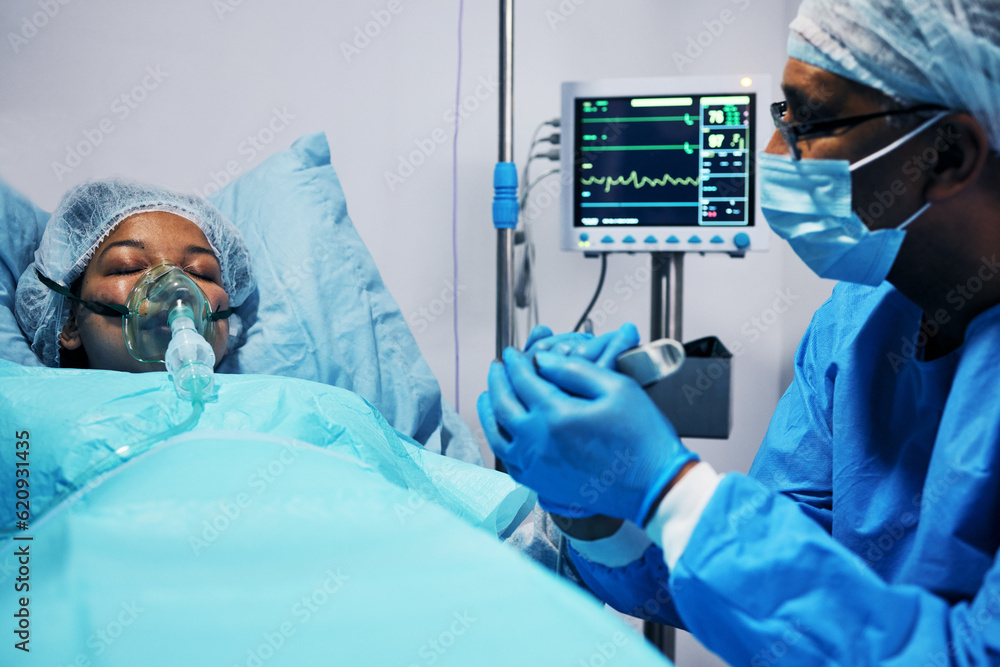 Healthcare, doctor and patient holding hands in hope after surgery, emergency care and hospital bed.