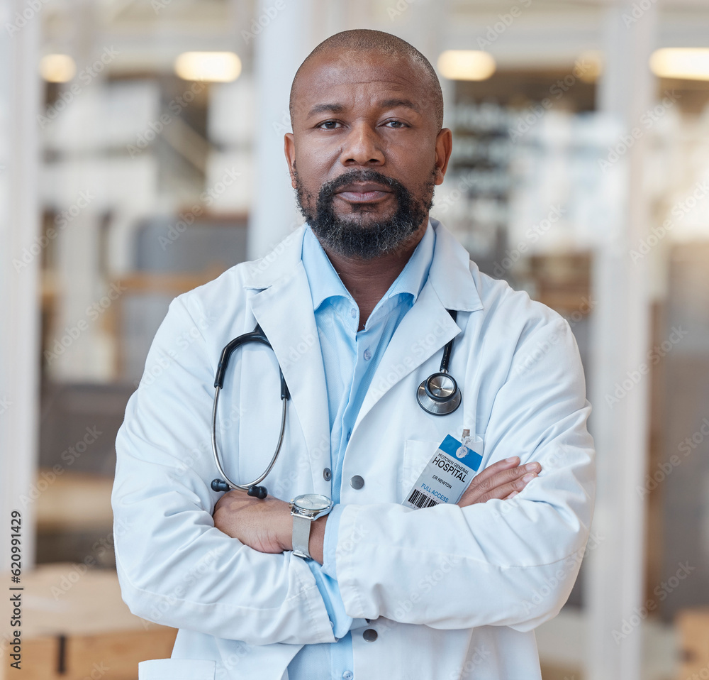 Portrait, black man and serious doctor with arms crossed in hospital for healthcare. African medical