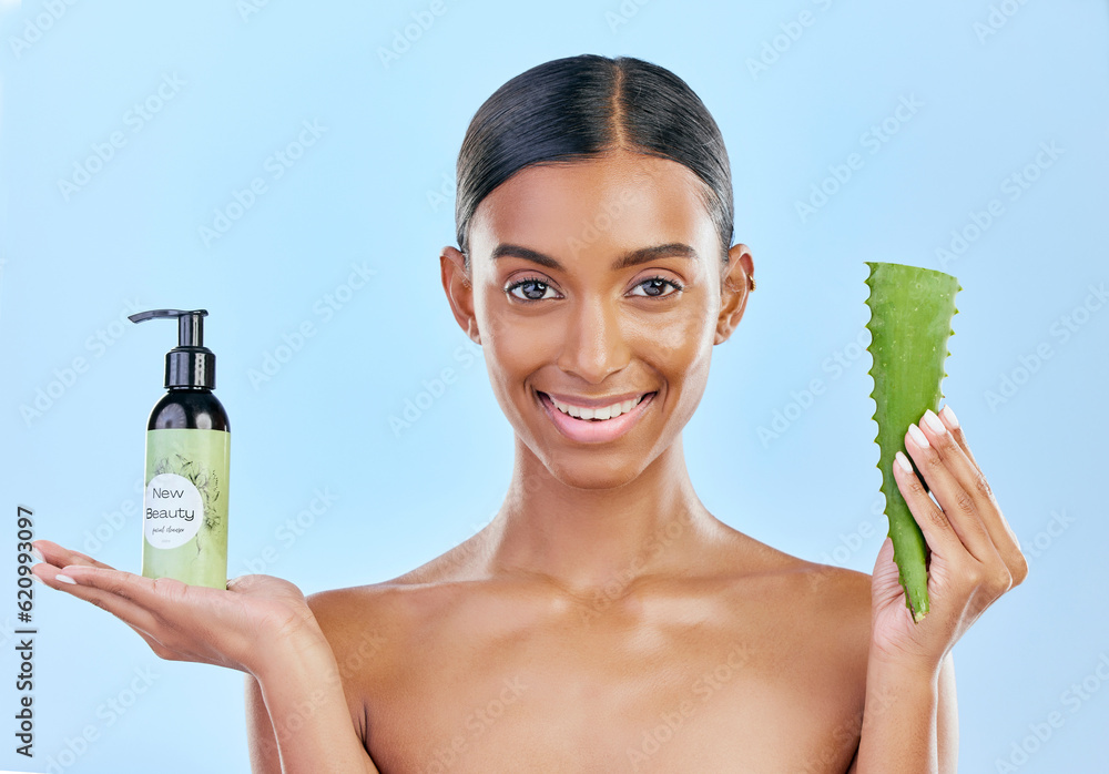 Woman, aloe vera and skincare in studio portrait with smile, natural choice and happy by blue backgr