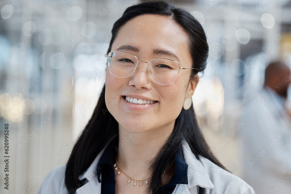 Asian woman, face and happy doctor in hospital for healthcare, wellness and glasses. Medical profess