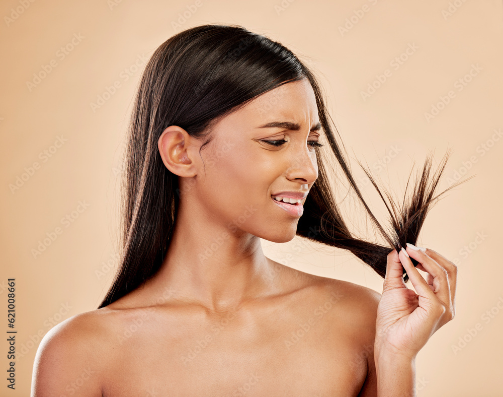 Woman, worry and split end in studio, background and beauty concern of hair loss, problem and damage