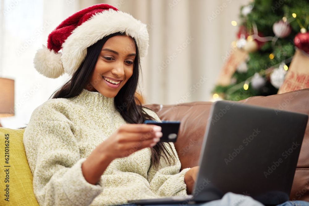 Woman, laptop and credit card, e commerce and Christmas shopping, online payment for gift and bank a