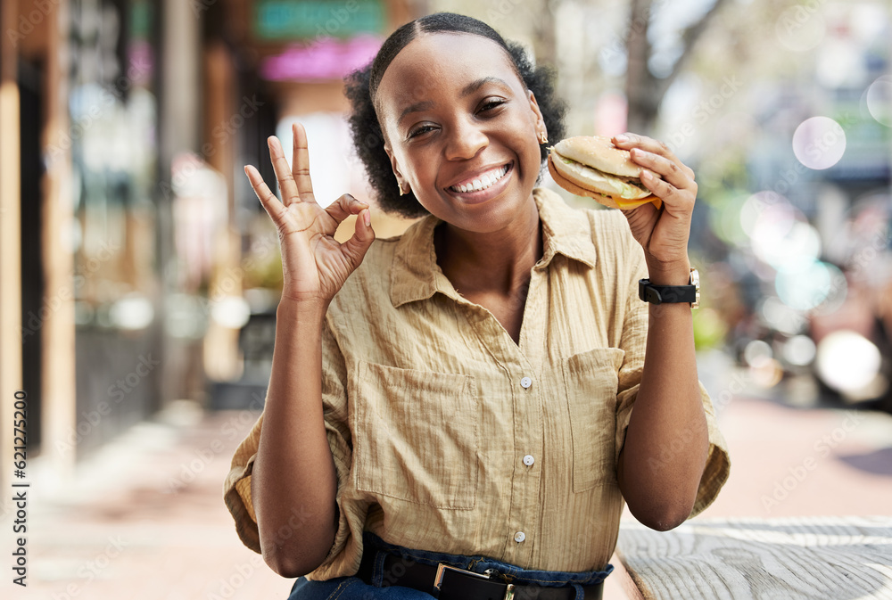 Burger, okay sign and portrait of woman in city, outdoor restaurant and happy customer experience or