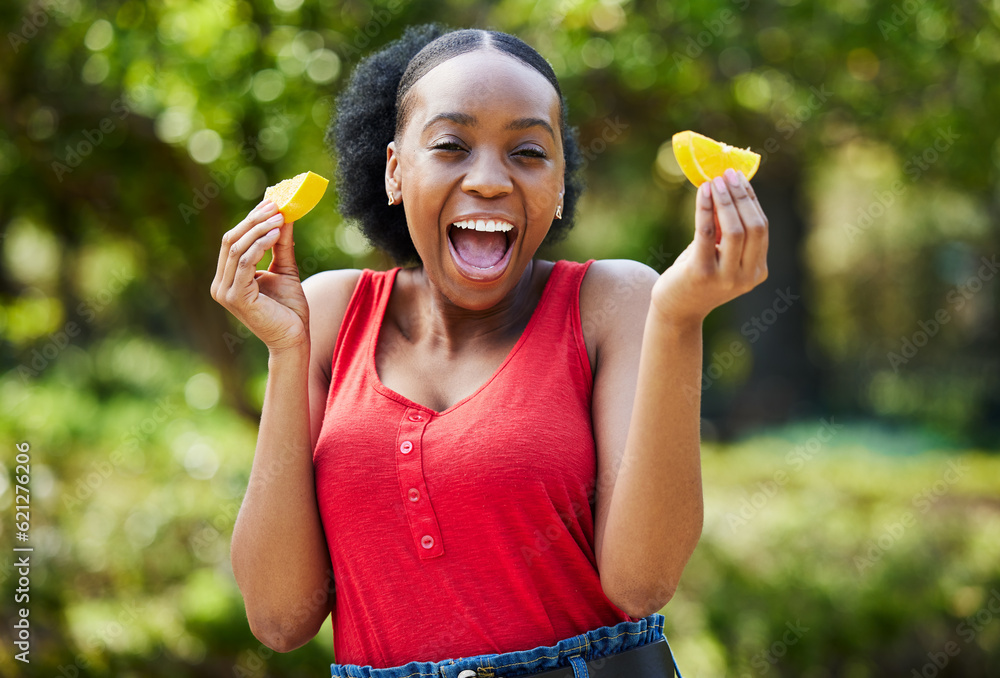 Happy black woman, orange slice and natural vitamin C for nutrition or citrus diet in nature outdoor