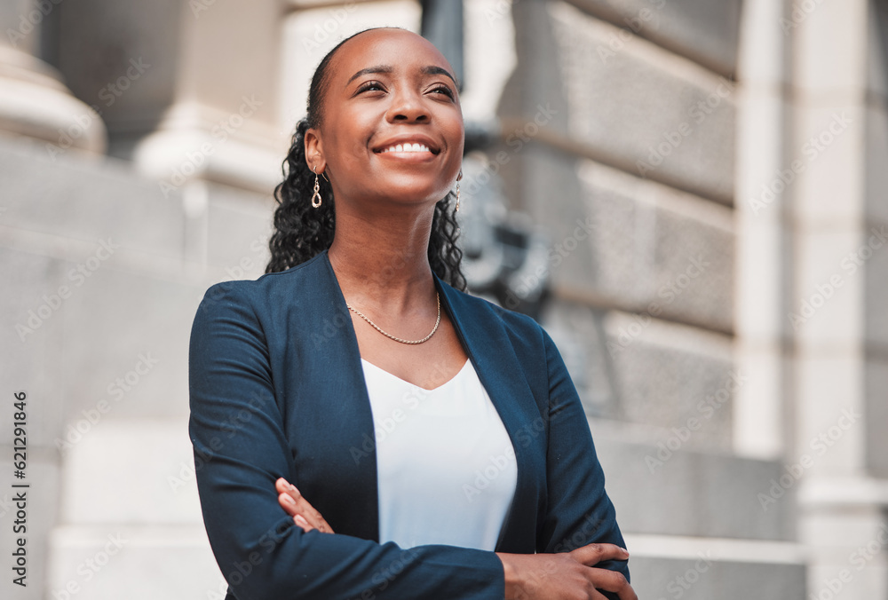 Arms crossed, happy black woman or lawyer thinking with smile or confidence working in a law firm. C