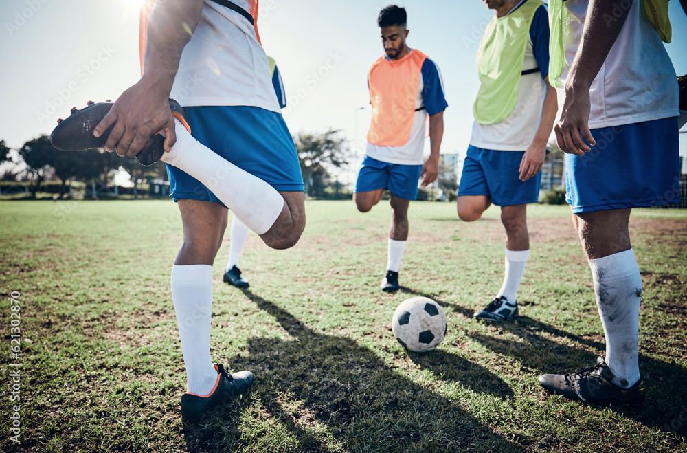 Stretching legs, football player and men training on a field for sports game and fitness. Male socce