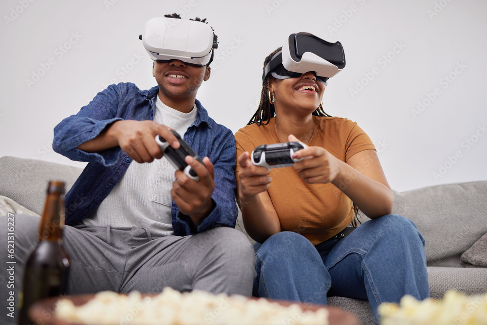 Happy, playing and a couple with vr games, metaverse glasses and digital competition on the sofa. Sm