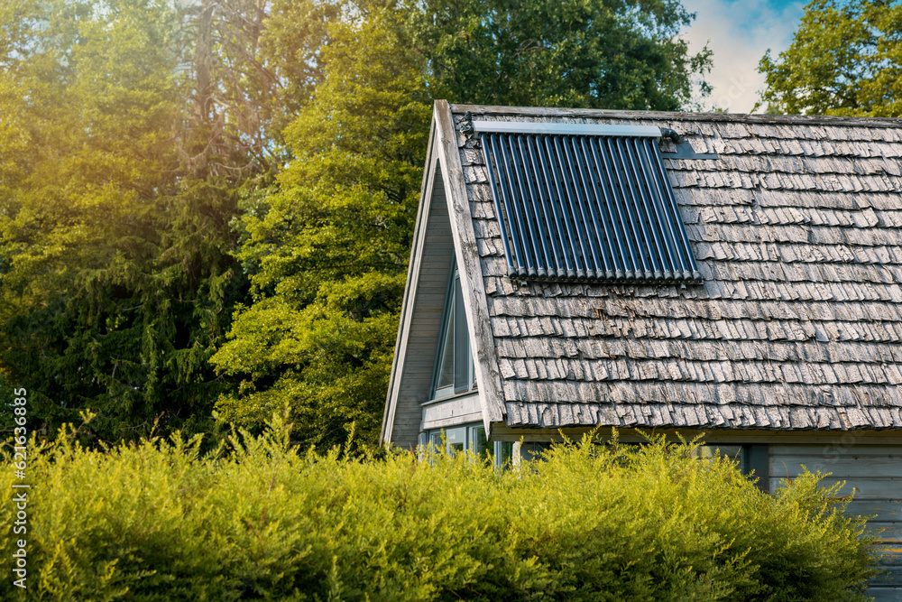 solar water heater on the house roof. evacuated tube collector