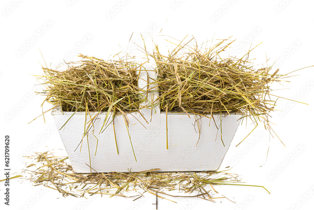 Straw in wooden basket on white background