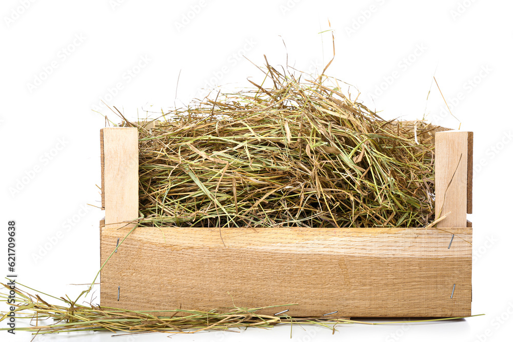 Straw in crate on white background