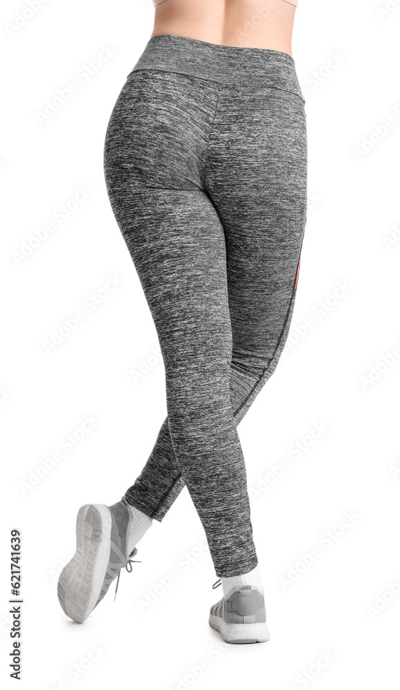 Sporty young woman in leggings on  white background, back view