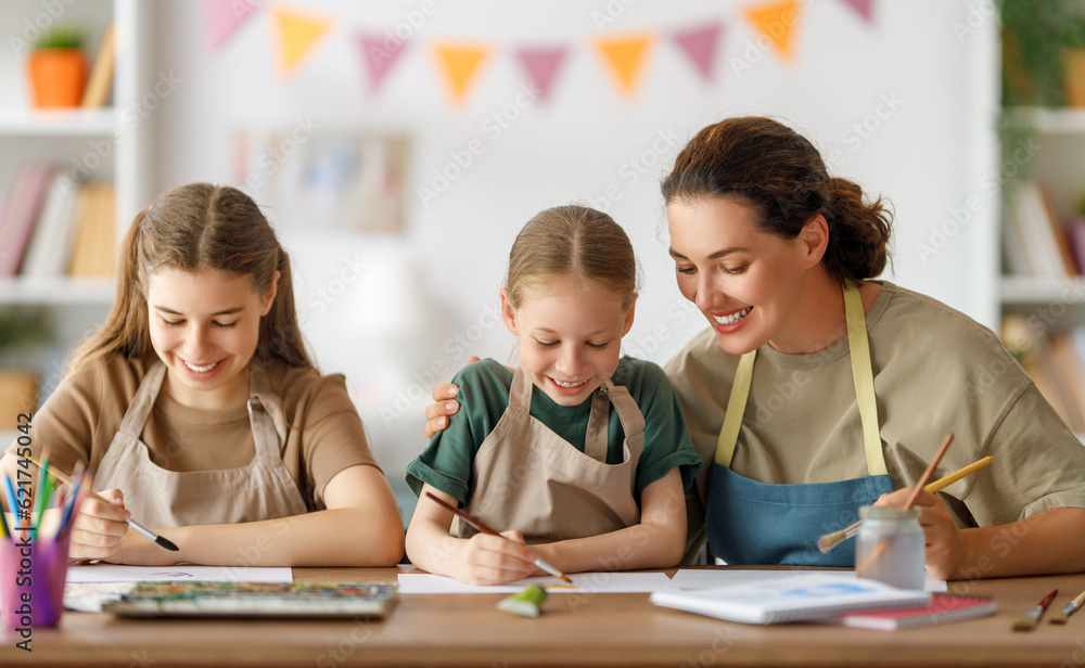 kids and teacher at the art class