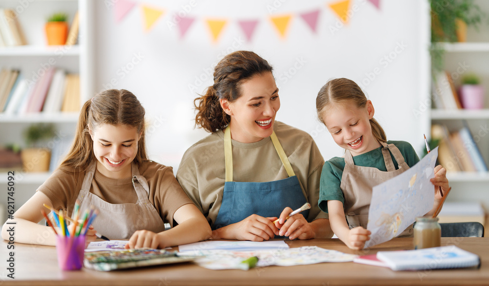 kids and teacher at the art class