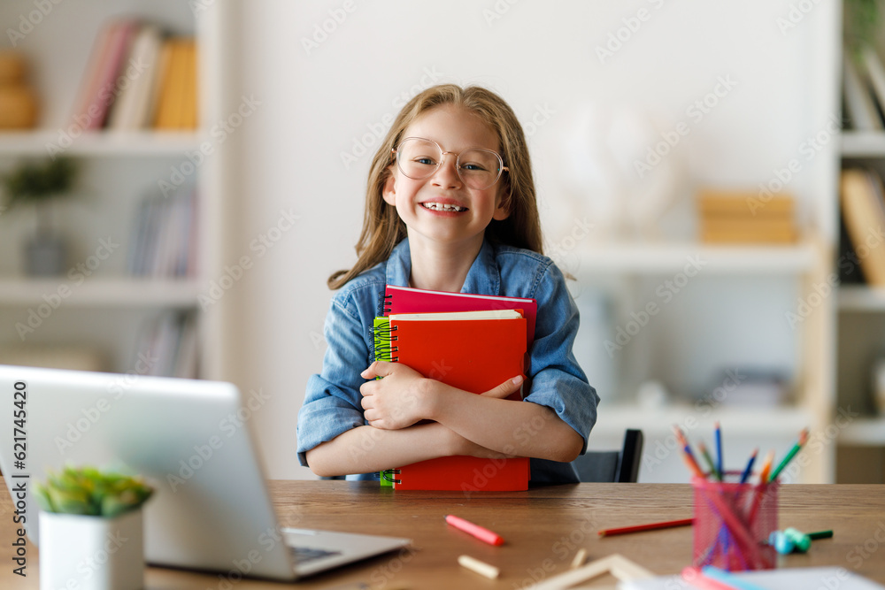 Girl doing homework or online education.