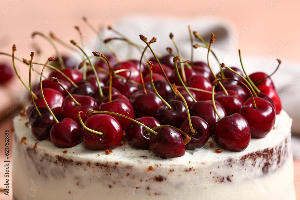 Tasty cake with fresh cherries, closeup