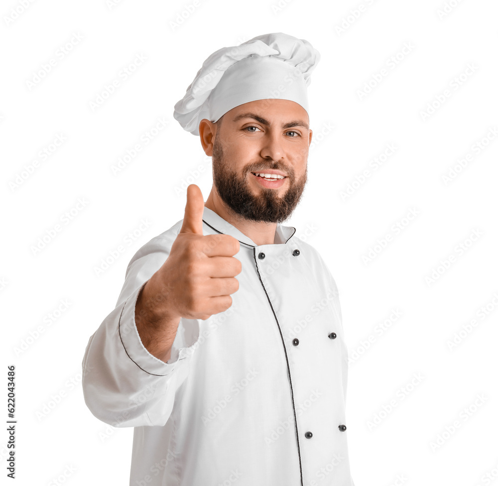 Male baker in uniform showing thumb-up on white background